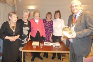 The salver being presented to Inner Wheel President Maureen Robson by Martyn Jenkins. The winning team comprised Vivien Scott, Suzanne Hamnett, June Hudspith and Cynthia Livesey.